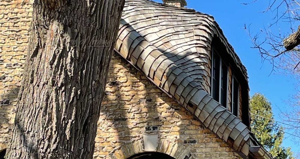 Steam Bent Cedar Shingles 3 close up of a home with cedar bent shingles and brick