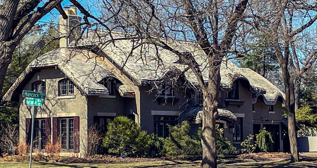 house with steam bent cedar shingles.