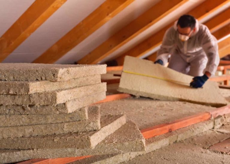 Types of Attic Insulation + 3 Ways to Avoid Danger & Damage 5 installing a type of attic insulation