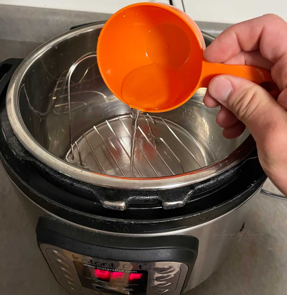 Instant Pot Hard Boiled Eggs (12 Easy Steps for Perfect Results) 2 adding water to instant pot