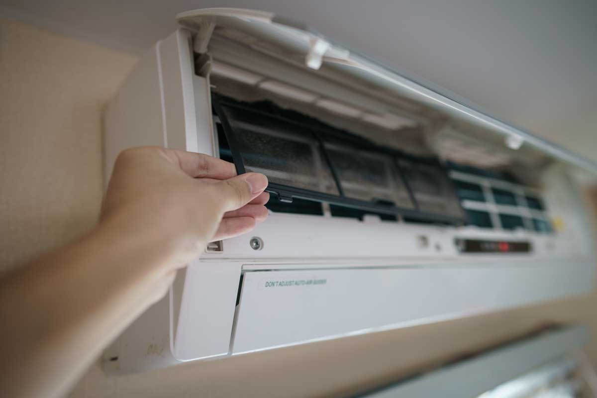 Mini Split- Ductless Heating & Air Conditioning: What It Is + Why You Need One 4 dirty mini split air filter on air conditioner head