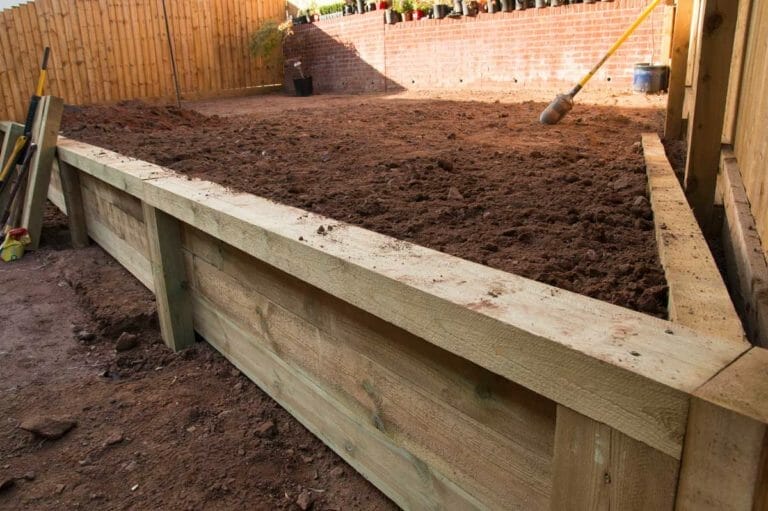 Garden Leveling: Leveling a Sloping Garden (Step-by-Step) 9 leveling a garden with a retaining wall