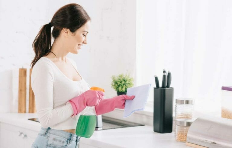 Group Reveals Secrets To Keeping Your House Always Clean 7 woman cleaning kitchen