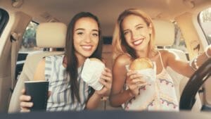The Food Each U.S. State is Known For 1 women in car eating