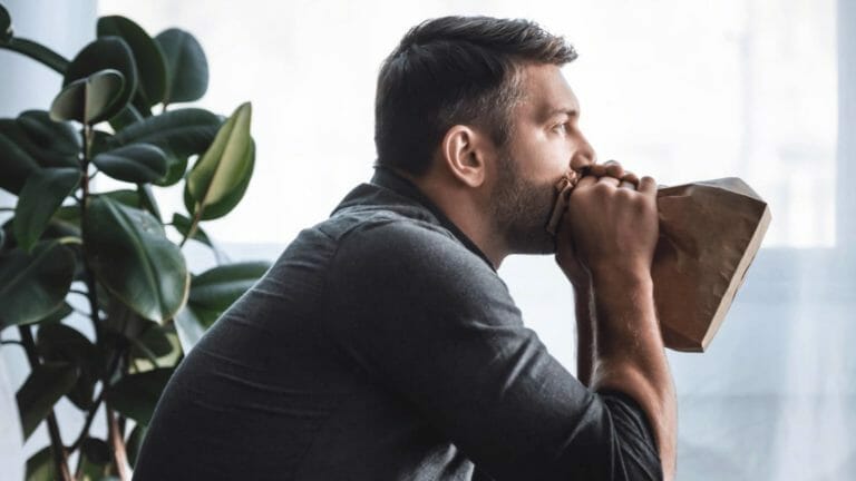 10 Houseplants People Admitted They Will Never Purchase Ever Again 1 frustrated man with houseplant