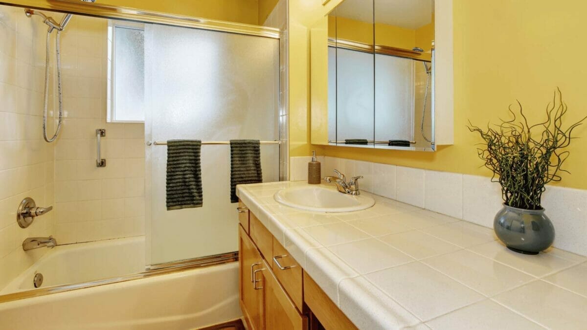 23 Outdated Home Trends Millennials Hate, But Boomers Love 16 tile countertop in bathroom