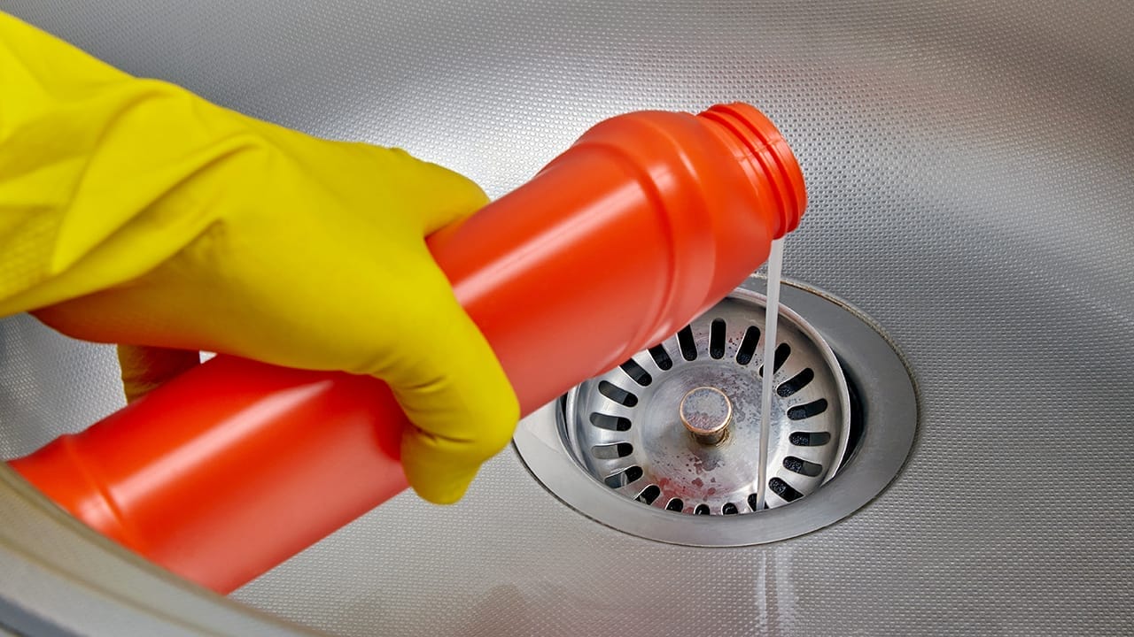 5 Steps to Instantly Get Rid of Drain Flies Permanently 7 5 Steps to Instantly Get Rid of Drain Flies Permanently - pouring chemical on drain ss2159785061