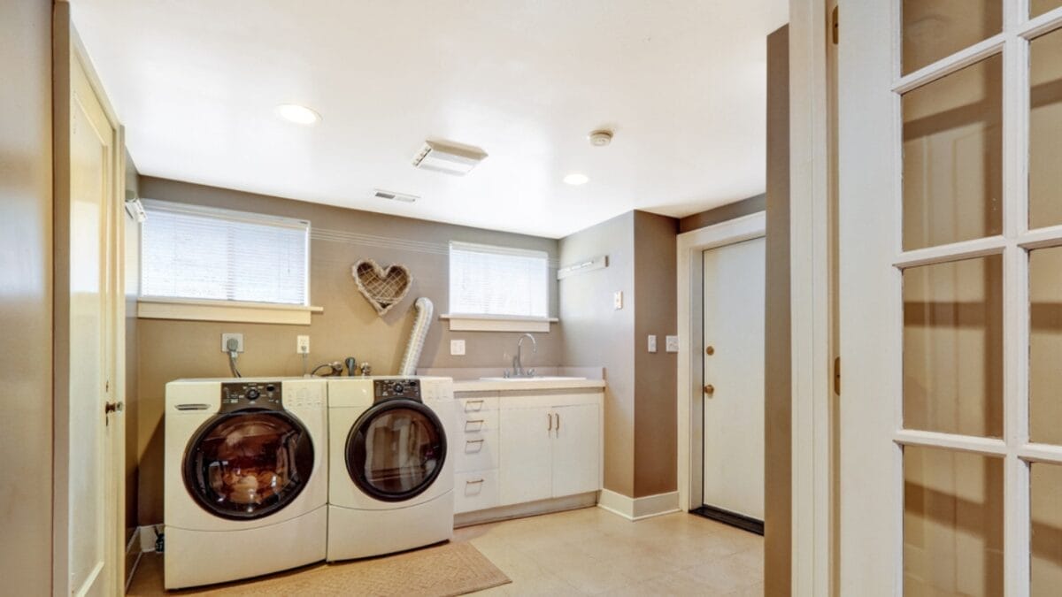 15 Clever Ways to Maximize Space in Your Tiny Laundry Room - bright light laundry ss207465703