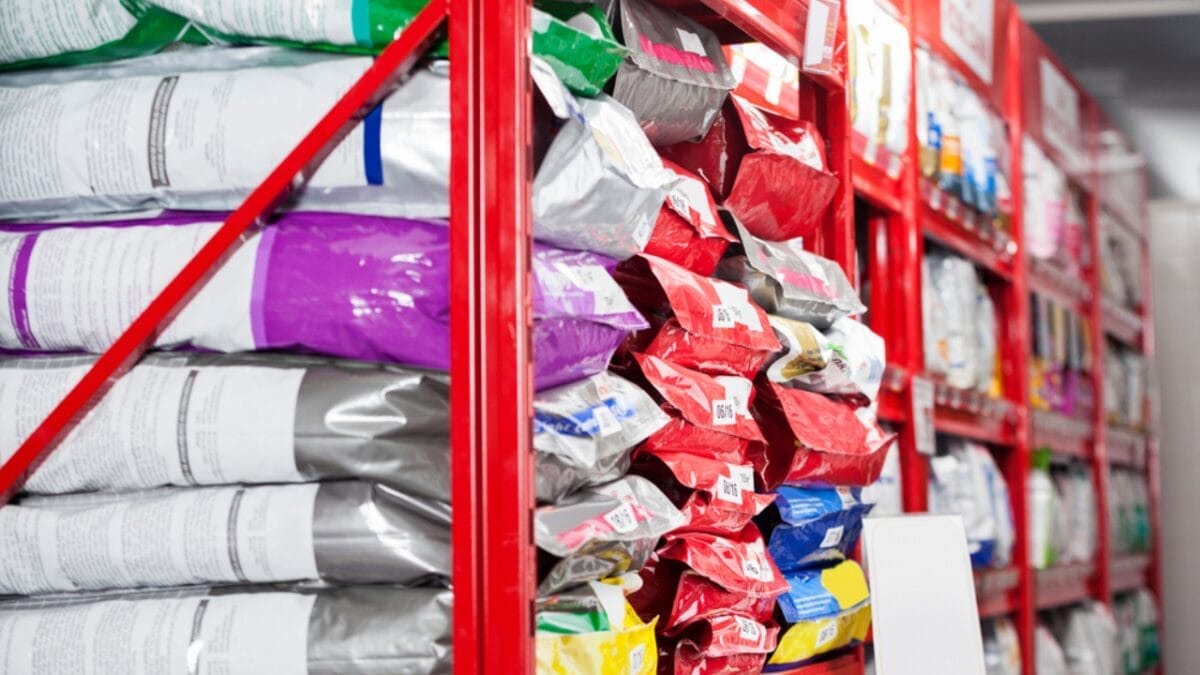 10 Things to Do Before Bringing Your Rescue Dog into Your Home - dog food in pet shop dp113616928