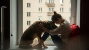 Elevate Your Mood: 7 Dog Breeds for Fighting Depression 1 Elevate Your Mood: 7 Dog Breeds for Fighting Depression - dog with depressed owner ss1841622688