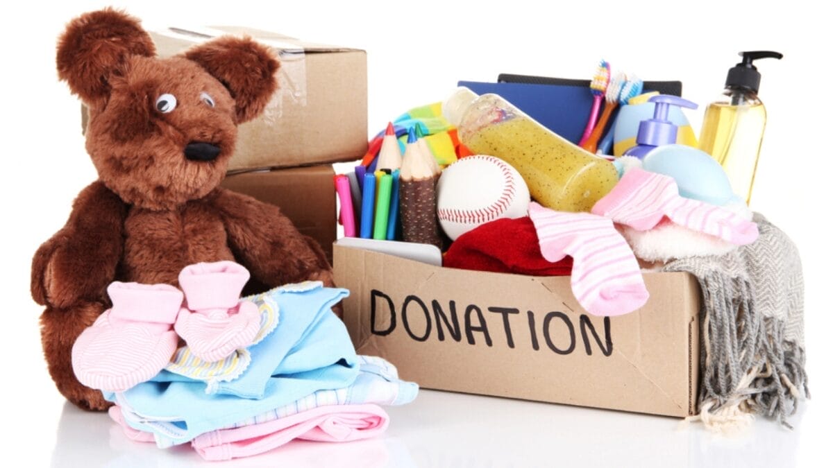 12 Tiny Habits to Prevent Your Home from Descending into Clutter Chaos - donation box with stuffed toy dp27242261