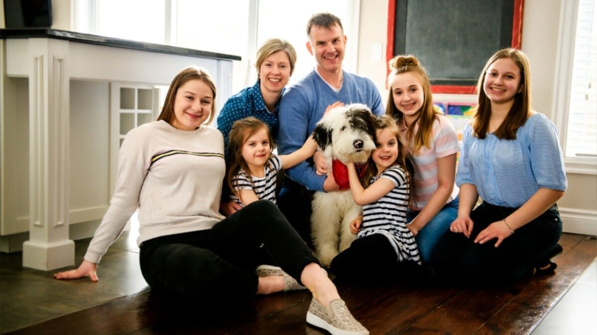 From Hidden Eyes to Tail-less Births: 9 Little-Known Things About Old English Sheepdogs - english sheepdog with family ss1386782093