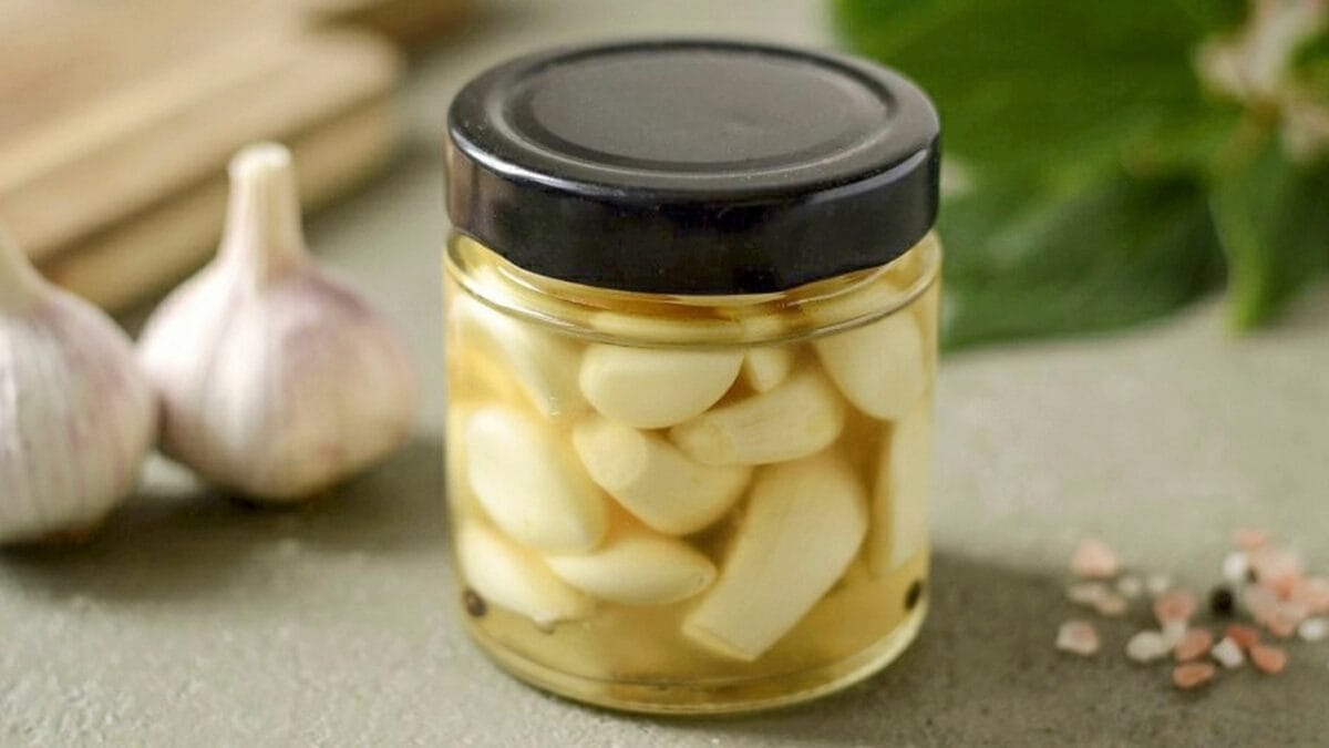 Calm Your Bronchitis Cough with These 12 Simple Home Remedies - garlic with water dp466031420