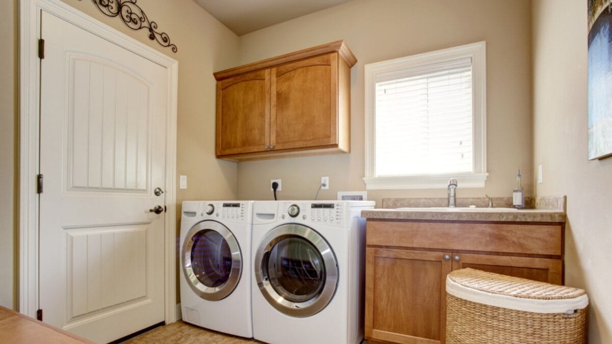 15 Clever Ways to Maximize Space in Your Tiny Laundry Room - laundry door space ss449190694