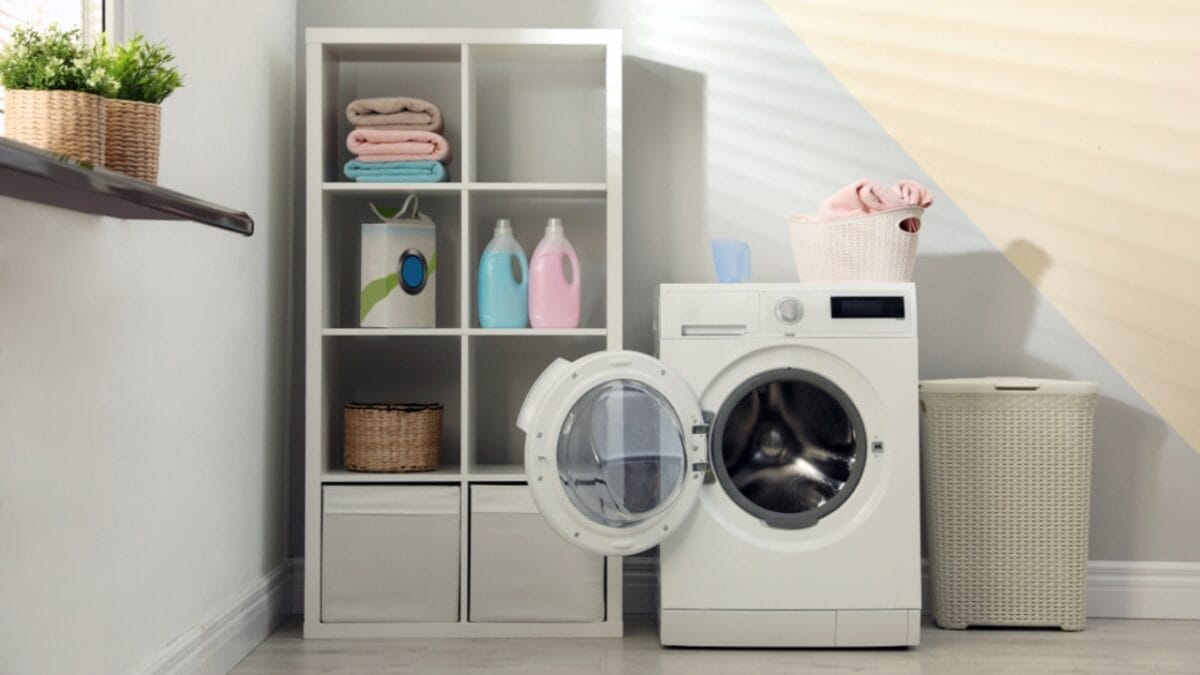 15 Clever Ways to Maximize Space in Your Tiny Laundry Room - laundry with cabinet ss1386282569