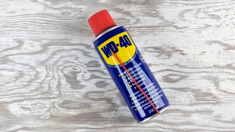 How to Use WD-40 to Keep Mice & Rats Out of Your Home 1 How to Use WD-40 to Keep Mice & Rats Out of Your Home - wd 40 on table ss2162810571