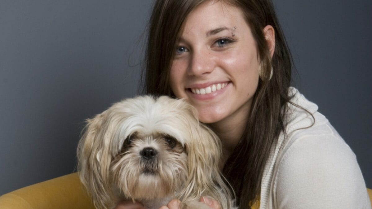 The Little Lion Dog of Royals: 10 Facts About the Lowchen Breed 7 The Little Lion Dog of Royals: 10 Facts About the Lowchen Breed - woman hugging lowchen dog in chair ss13351933