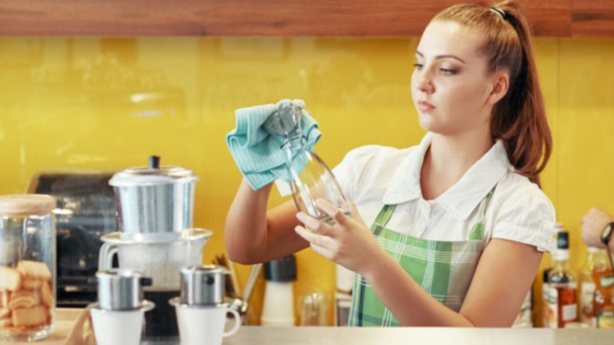 Why Disinfecting Wipes Should Never Touch Your Food Containers - woman wiping jar ss2006271224