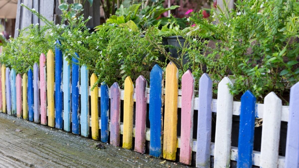 15 Budget-Friendly Ways to Makeover Your Backyard 8 15 Budget-Friendly Ways to Makeover Your Backyard - Colorful Fence Garden dp59017797