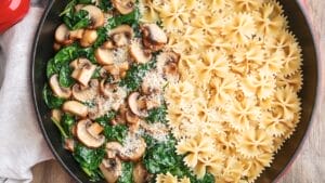 This Parmesan Spinach Mushroom Pasta Skillet Recipe is Savory, Creamy & Ready in Minutes 1 This Parmesan Spinach Mushroom Pasta Skillet Recipe is Savory, Creamy & Ready in Minutes - Parmesan Spinach Mushroom Pasta Skillet recipe 2