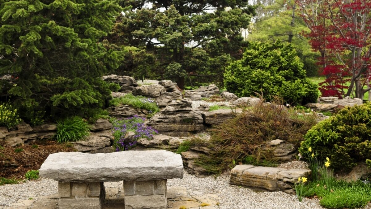 Zen & the Art of Rock Placement: 21 Tranquil Boulder Landscaping Ideas 5 Zen & the Art of Rock Placement: 21 Tranquil Boulder Landscaping Ideas - Rock Bench in Garden dp4636557