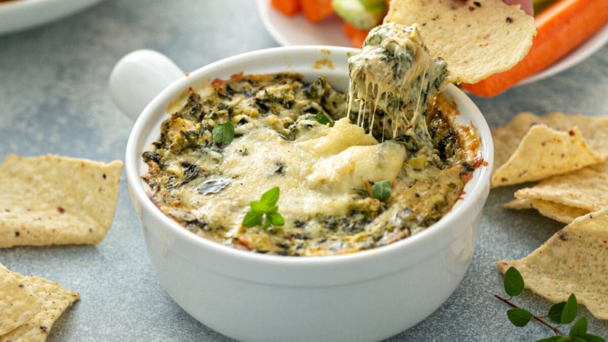 10 Old-School Appetizers That People Still Love Today 8 10 Old-School Appetizers That People Still Love Today - Spinach Artichoke Dip ss1886027227