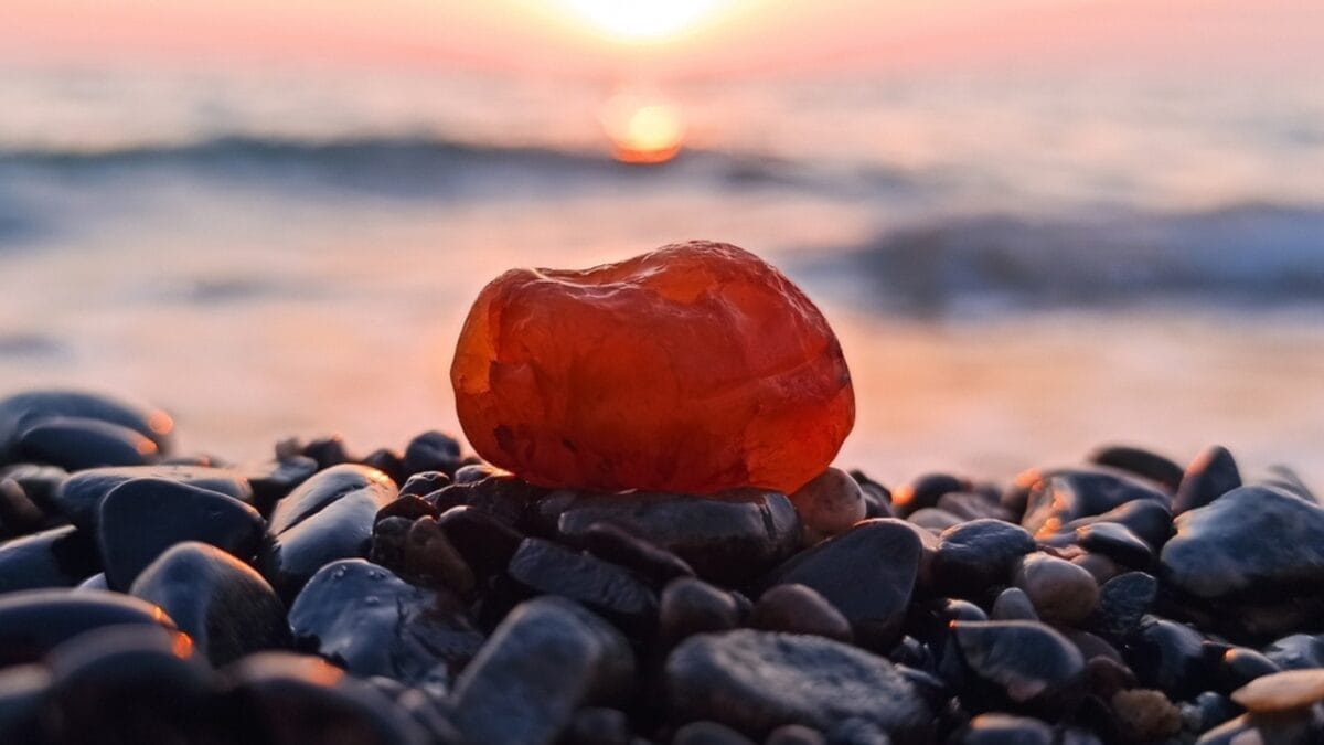 Are You a Magnet for Negativity? Use These 8 Crystals to Help Ward off Bad Vibes 9 Are You a Magnet for Negativity? Use These 8 Crystals to Help Ward off Bad Vibes - carnelian stone beach ss2060458586