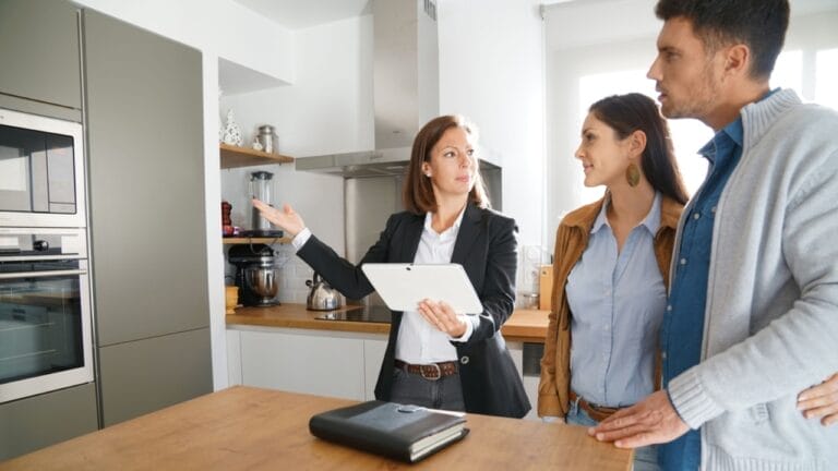 25 Questions Every Homebuyer Should Ask Their Realtor 5 25 Questions Every Homebuyer Should Ask Their Realtor - house with agent talking dp158942334