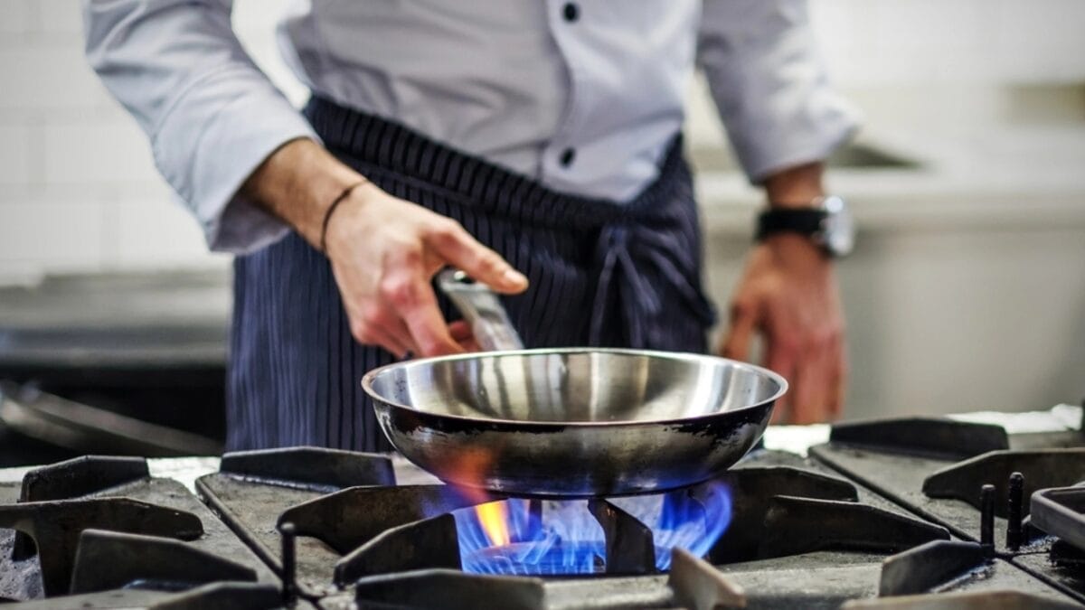 The Dangers of Gas Stoves: Why It's Time to Rethink Your Kitchen Appliances 4 The Dangers of Gas Stoves: Why It's Time to Rethink Your Kitchen Appliances - man cooking dp168334422