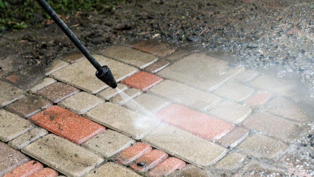 Say Goodbye to Driveway Weeds with These 15 Methods 6 Say Goodbye to Driveway Weeds with These 15 Methods - pressure washer dp390979316