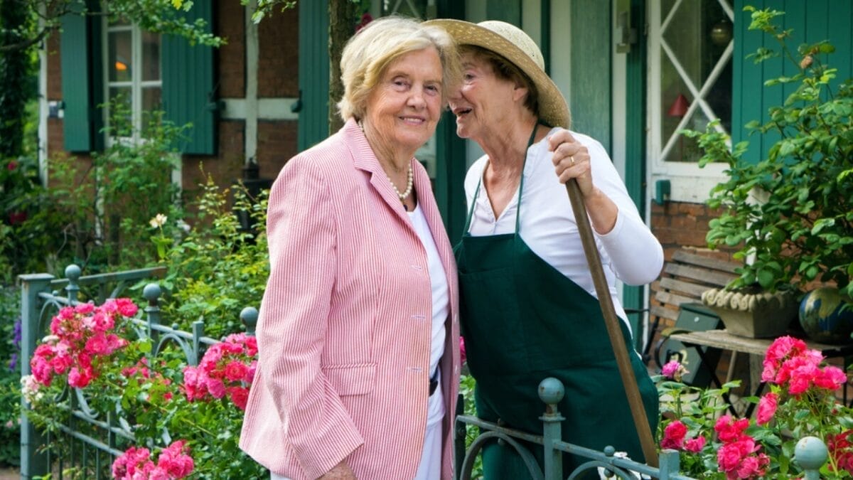 Homeownership Dreams Collide: Boomers’ Views vs. Millennials’ Reality - two senior talking dp128410720
