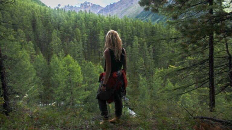 10 Powerful Ways Nature Enhances Your Mental Health 5 10 Powerful Ways Nature Enhances Your Mental Health - woman hiking dp178406982