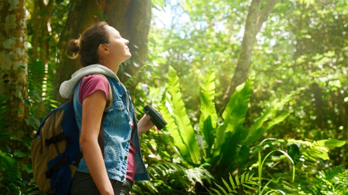 10 Powerful Ways Nature Enhances Your Mental Health 10 10 Powerful Ways Nature Enhances Your Mental Health - woman watching birds dp142193752