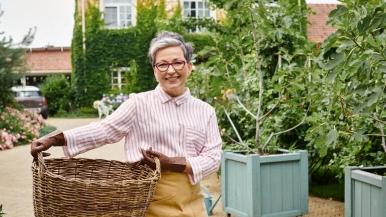 Growing Green for Less: 15 Ideas for Savvy Gardeners to Save Money 5 Growing Green for Less: 15 Ideas for Savvy Gardeners to Save Money - Woman caretaker gardening dp701800330