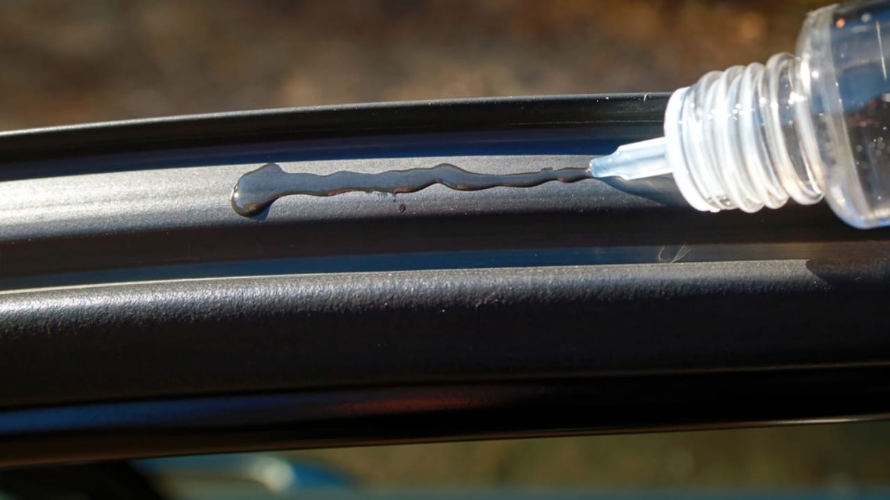 18 Pro-Level Car Cleaning Techniques for a Show-Stopping Vehicle 14 18 Pro-Level Car Cleaning Techniques for a Show-Stopping Vehicle - applying silicon lube ss2250906643