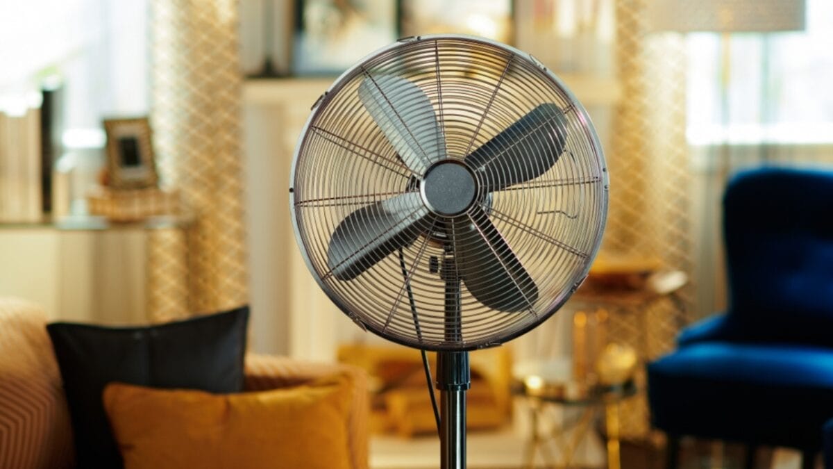 13 Clever Ways to Dry Clothes Indoors Without a Dryer - electric fan ss1402925459