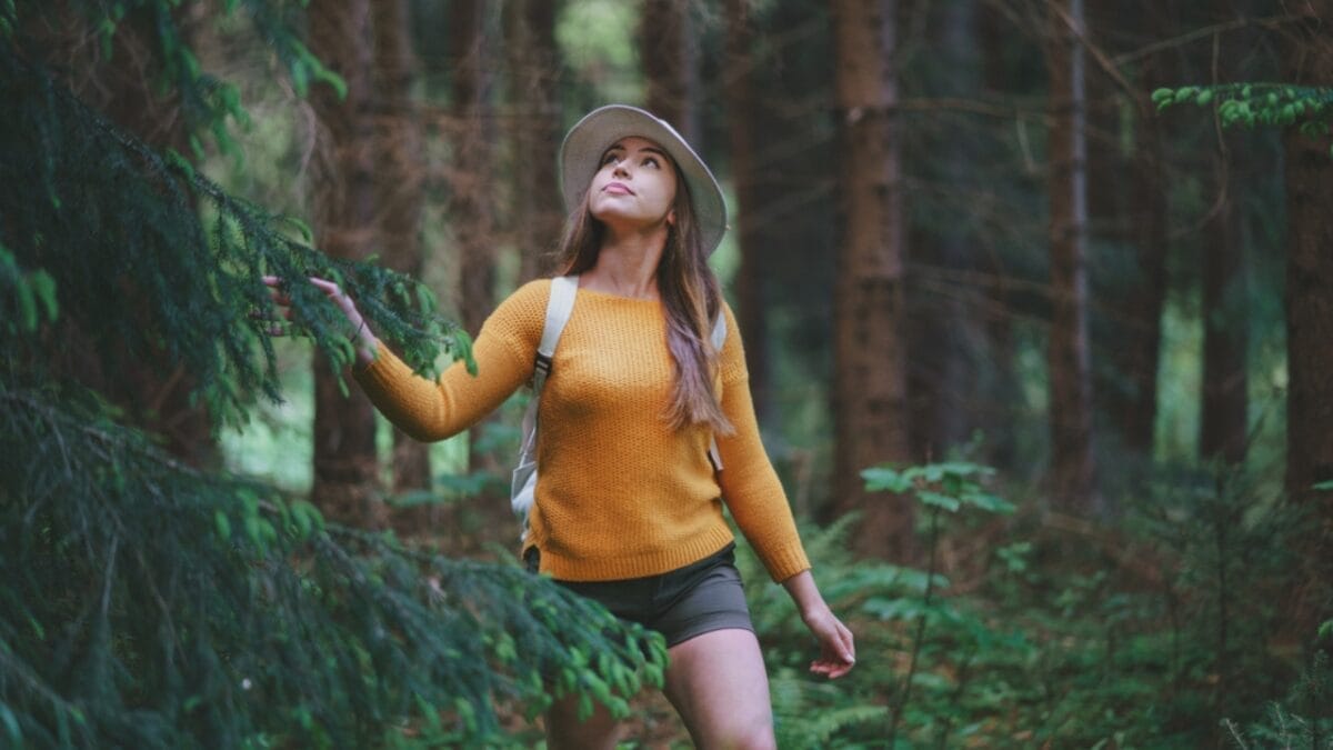 36 Calming Slow Living Hobbies & Habits for Ultimate Relaxation 25 36 Calming Slow Living Hobbies & Habits for Ultimate Relaxation - girl in forest dp383403918