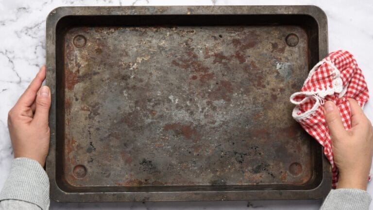 The Secret to Reviving Your Baking Sheets is a Common Medicine Cabinet Staple 2 The Secret to Reviving Your Baking Sheets is a Common Medicine Cabinet Staple - metal rectangular baking sheet ss1870018360