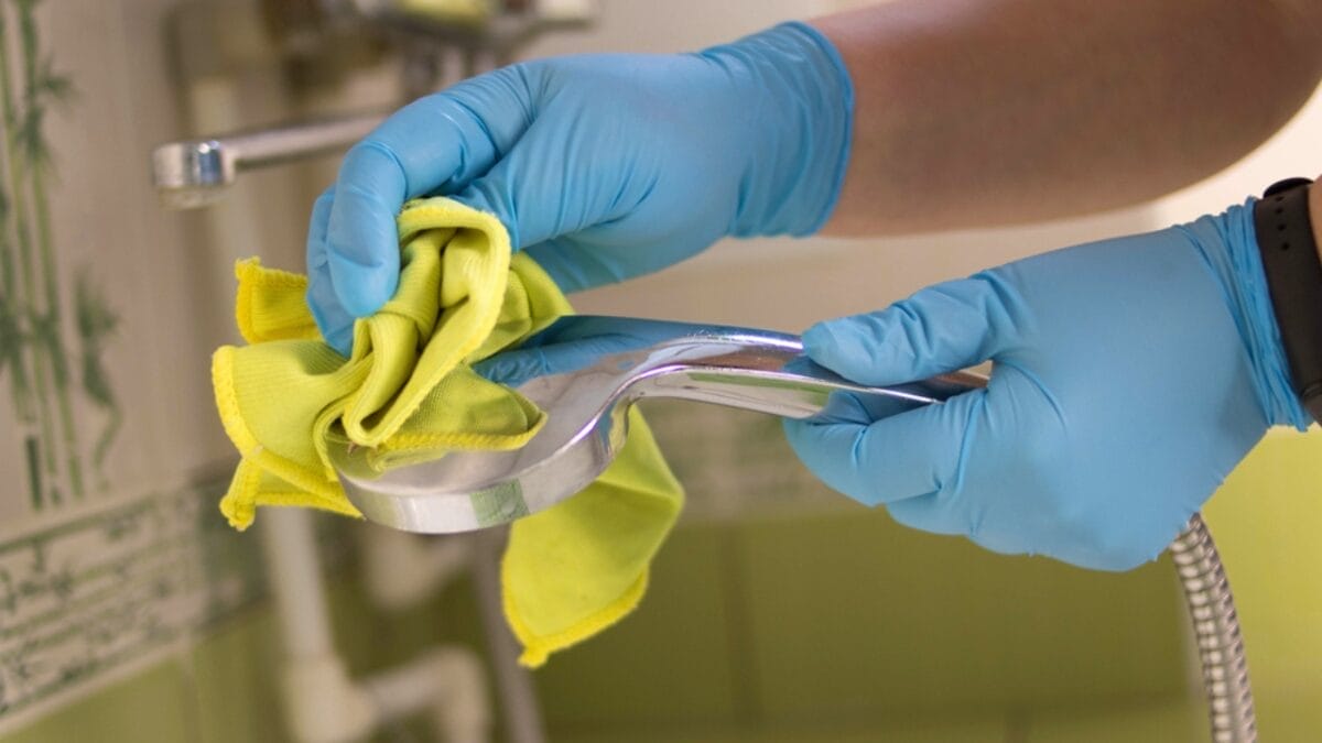 10 Common Cleaning Mistakes That Are Making Your Home Dirtier 7 10 Common Cleaning Mistakes That Are Making Your Home Dirtier - wiping shower ss1732329586