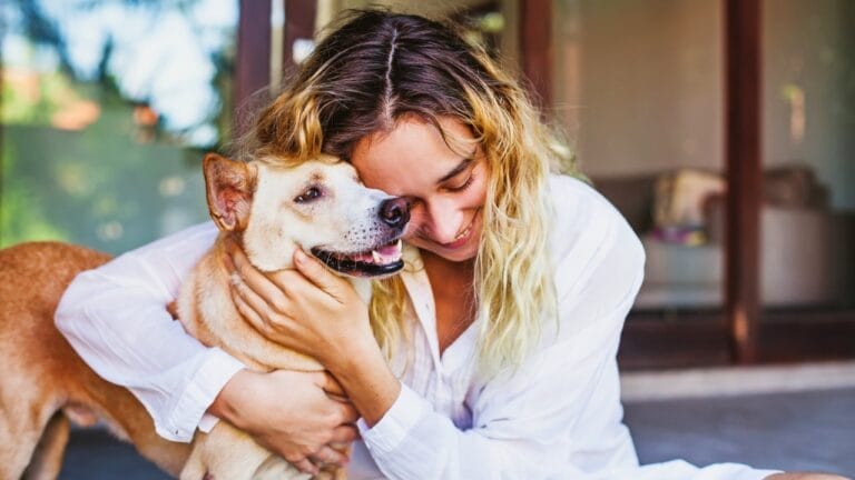 Does Your Dog Really Trust You... 15 Signs That Say Yes 5 Does Your Dog Really Trust You... 15 Signs That Say Yes - woman dog smelling ss1413445577
