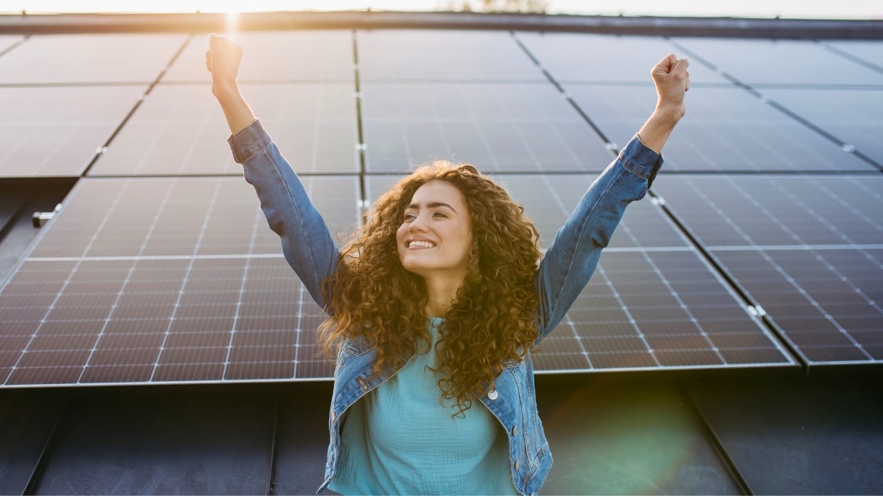 How One Man Outsmarted the Power Company & Got Them to Cover His Bill 5 How One Man Outsmarted the Power Company & Got Them to Cover His Bill - woman solar panels ss2309945911