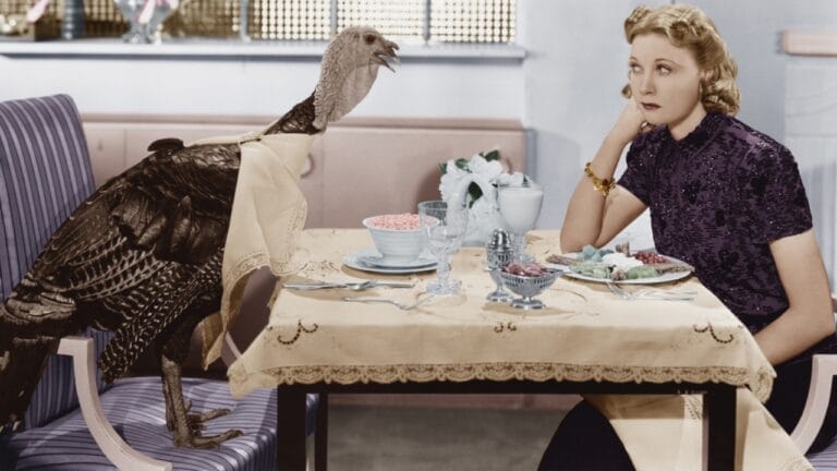 8 Birds We Used to Eat, But are Now Protected 7 8 Birds We Used to Eat, But are Now Protected - woman eating with turkey ss101118832