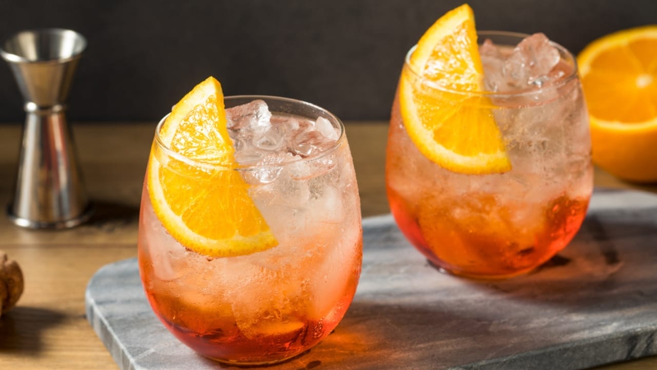 Mastering the Art of Simplicity: 20 Delicious 3-Ingredient Cocktails 9 Mastering the Art of Simplicity: 20 Delicious 3-Ingredient Cocktails - Aperol Spritz cocktail dp416933308
