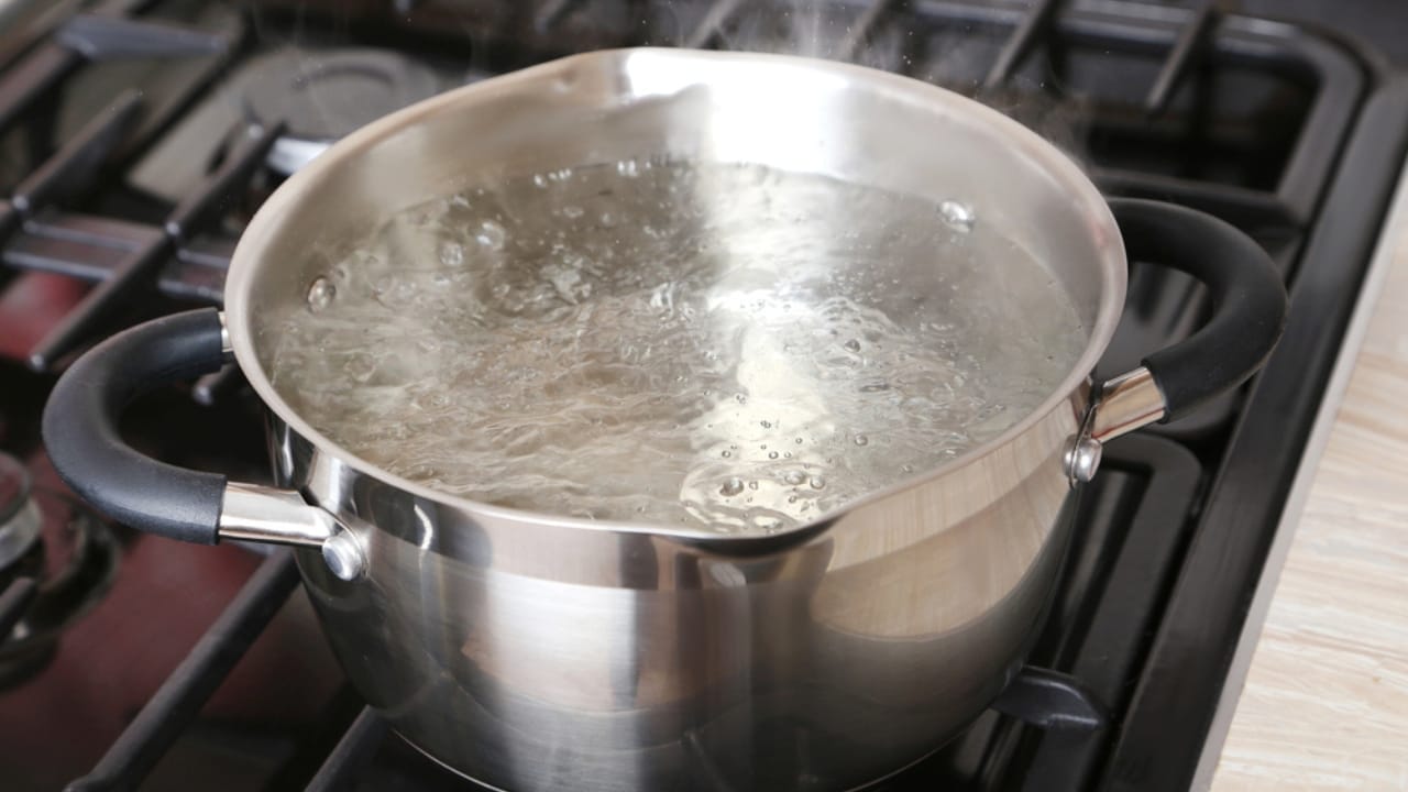 Nature's Ant-idotes: 14 Simple Ways to Get Rid of Ants Outside Naturally 3 Nature's Ant-idotes: 14 Simple Ways to Get Rid of Ants Outside Naturally - Boiling water dp133082290