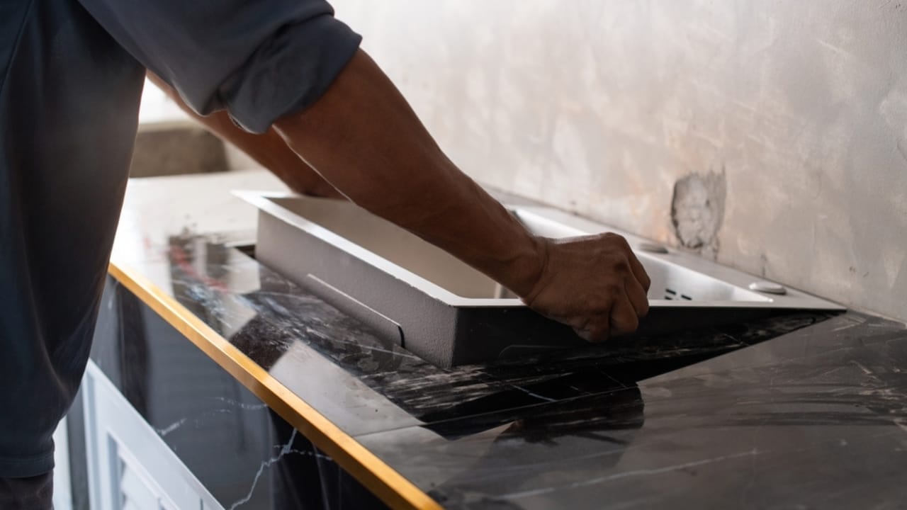 12 Budget-Friendly Home Renovations That Offer the Highest Returns 4 12 Budget-Friendly Home Renovations That Offer the Highest Returns - Changing sink ss2365145279