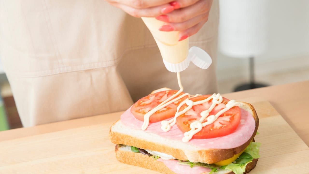 19 Ways to Slash Your Food Costs Without Sacrificing Quality 15 19 Ways to Slash Your Food Costs Without Sacrificing Quality - Making sandwich dp676509268