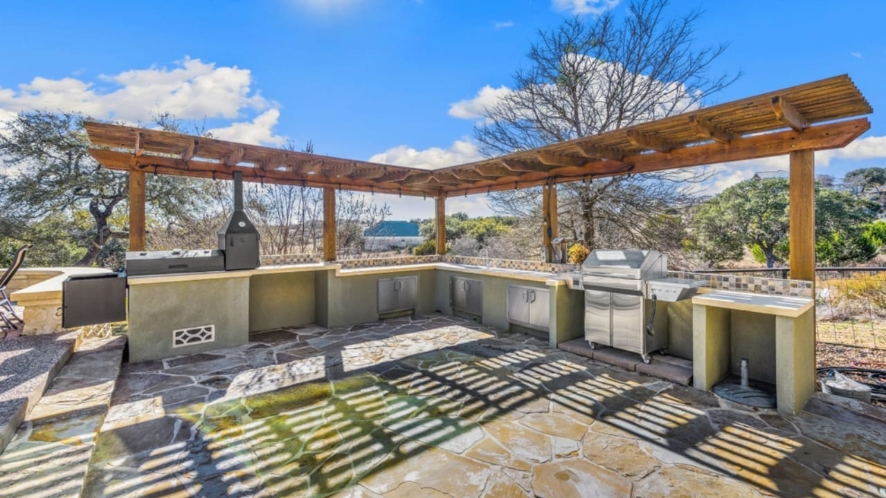 15 Home Upgrades That Aren’t Worth the Investment 16 15 Home Upgrades That Aren’t Worth the Investment - Outdoor kitchen ss2282897305