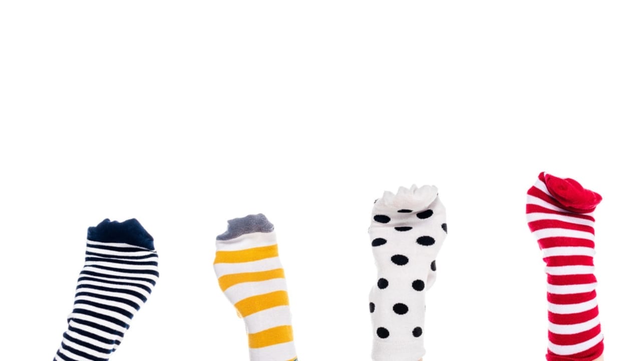 Old Socks, New Purpose: 20 Clever Ways to Reuse Them 3 Old Socks, New Purpose: 20 Clever Ways to Reuse Them - Socks on hands dp258849976