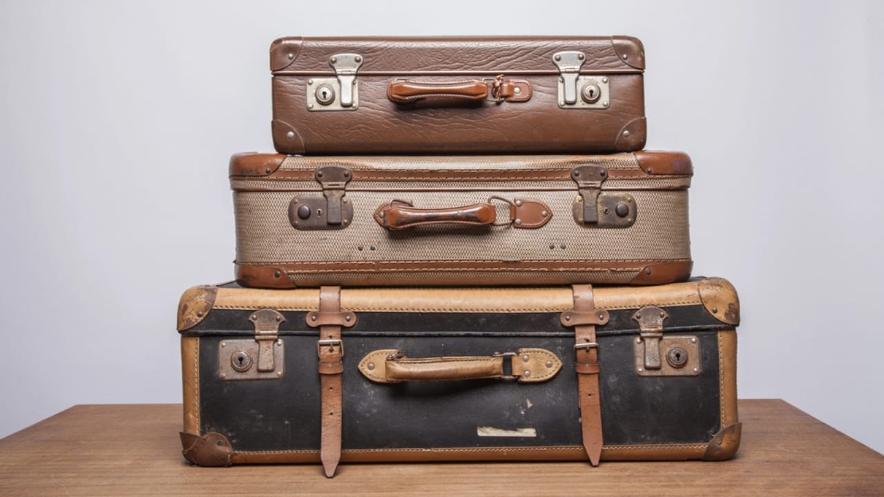 16 Space-Wasting Closet Items to Throw Out Right Now 18 16 Space-Wasting Closet Items to Throw Out Right Now - Suitcase dp317460596