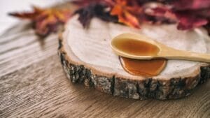 Tapping into Nature's Sweetness: 23 Trees That Produce Unique Syrups 1 Tapping into Nature's Sweetness: 23 Trees That Produce Unique Syrups - Syrup sugar in spoon ss1653080362